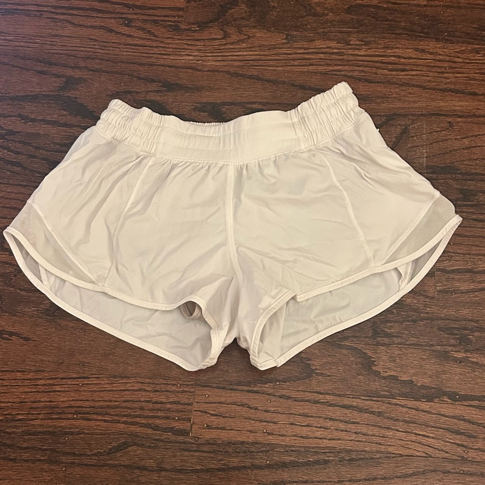 white lululemon low rise hotty hot shorts